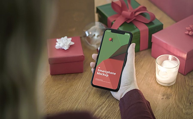 圣诞节元素居家场景手持iPhone手机设计样 iphone-mockup-christmas-scenes